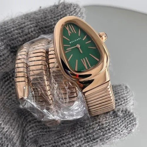 Rose golden with Green Dial Snake watch